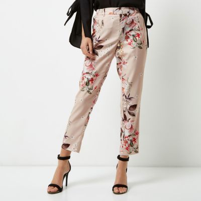 Pink floral print tapered trousers